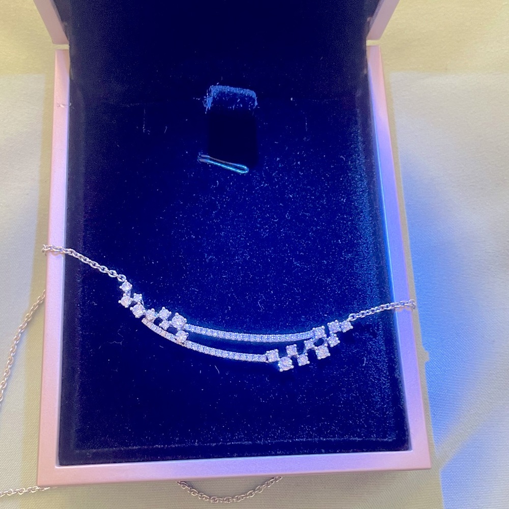 Gorgeous diamond “shooting star” bar necklace.